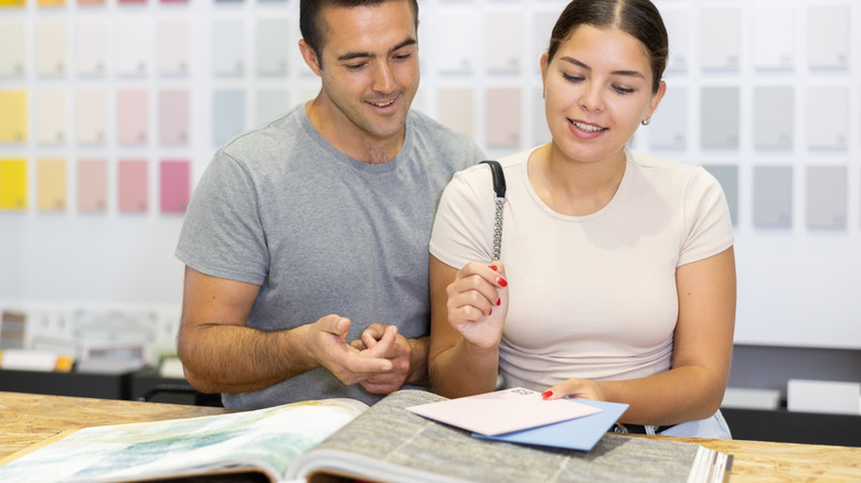 Couple shopping for paint colors