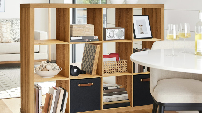 A white room features Walmart's Better Homes & Gardens cubby storage unit