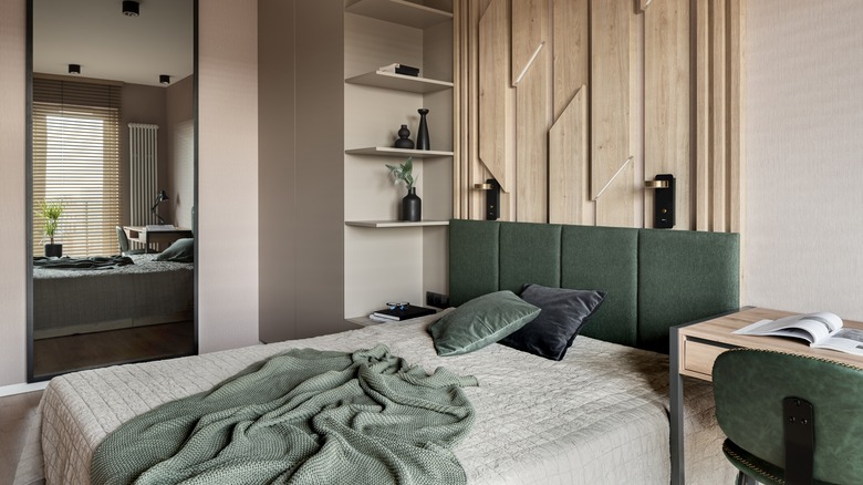 Muted bedroom with wood wall