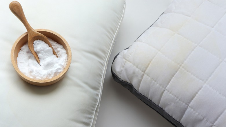 Baking soda sprinkled on pillows