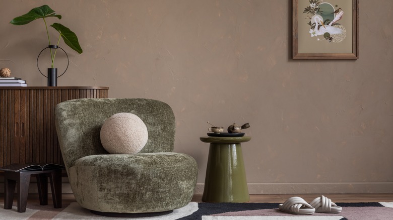 living room with green furniture 