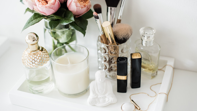 perfume bottles with flowers