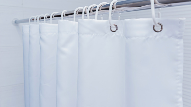 White plastic shower curtain