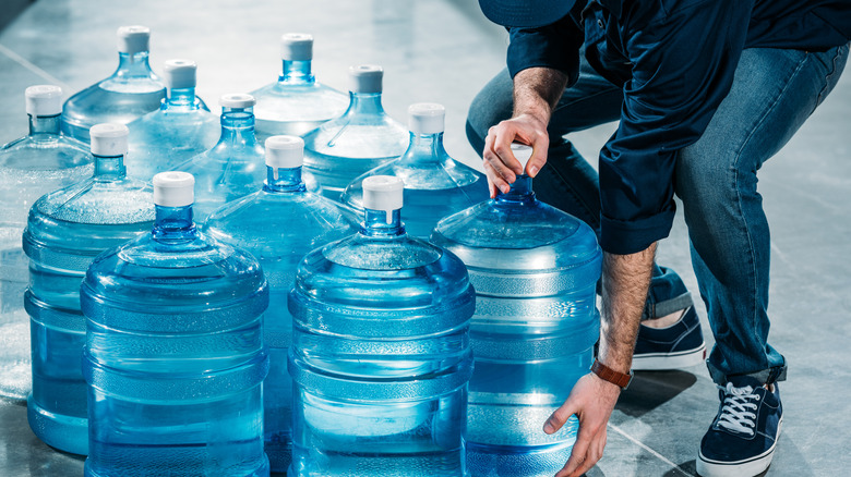 Man organizing water 