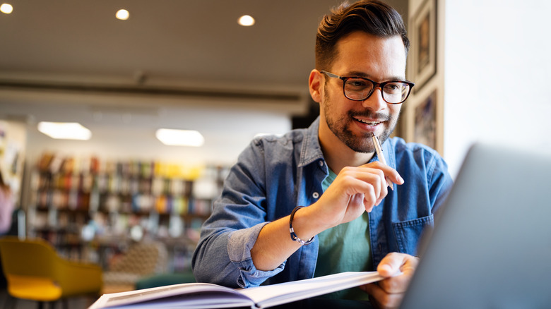 Man working in library 