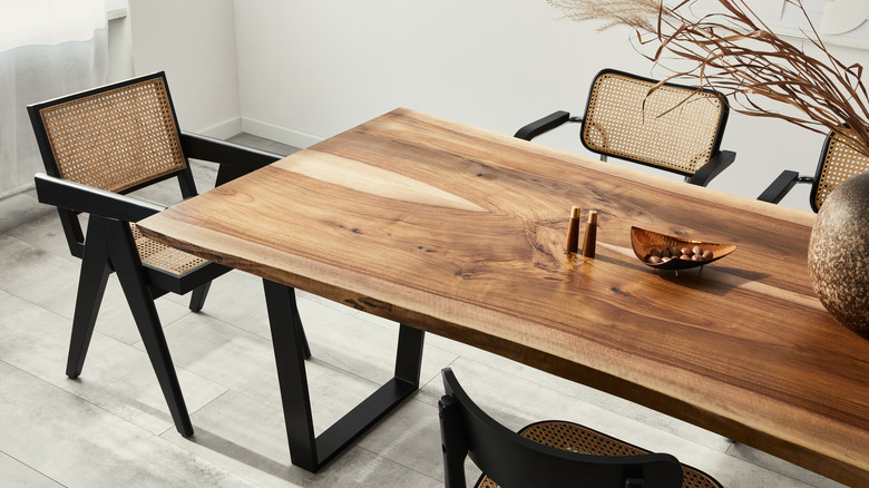 Wooden table with cane chairs