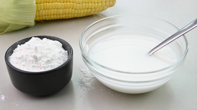 A bowl of cornstarch is mixed in water