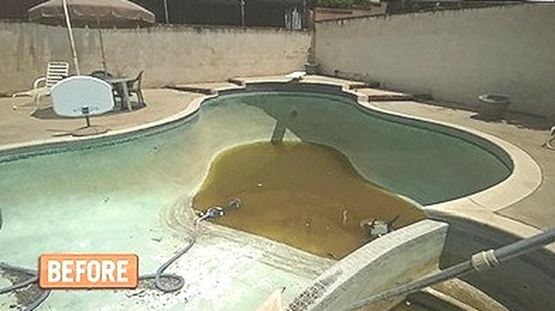 Empty pool with platform steps