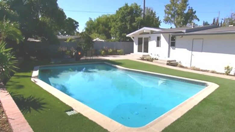 Pool with green lawn