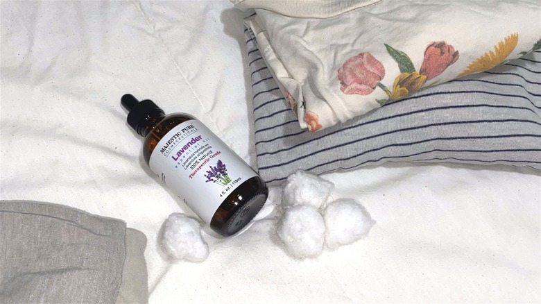 Lavender essential oil with cotton balls