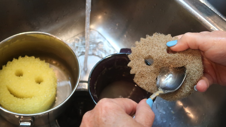 washing pans with Scrub Daddys