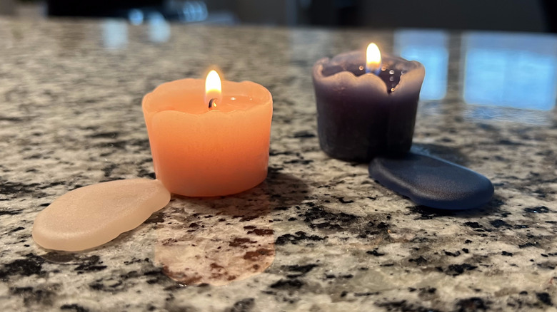 pink and blue candles burning