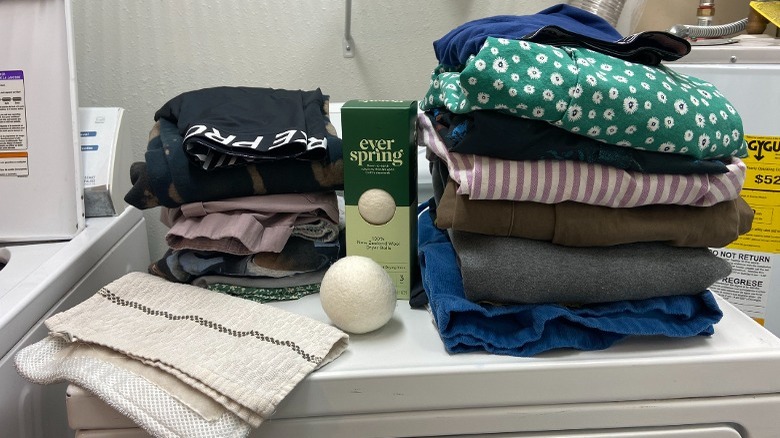 Folded laundry with dryer balls