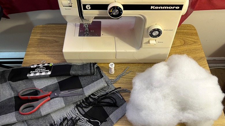 Sewing machine with scarf and supplies