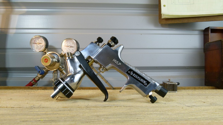 Spray gun and valves