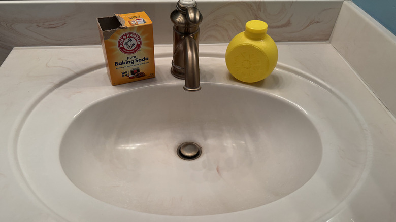 Baking soda, lemon juice, sink