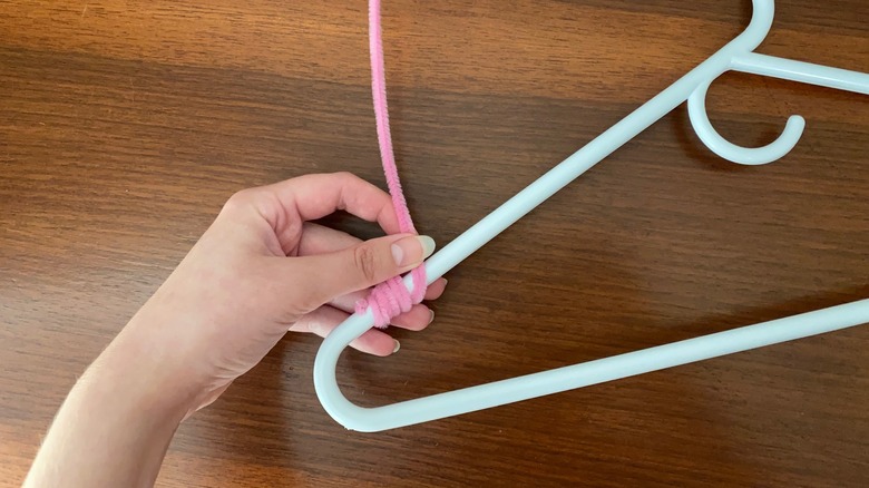 Wrapping pipe cleaner on hanger