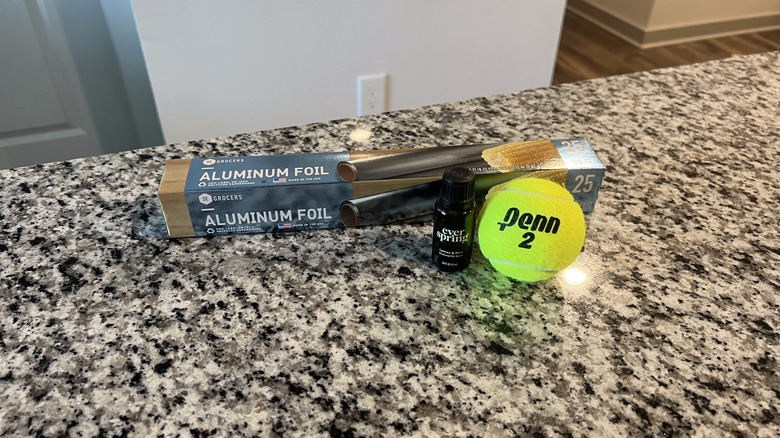 tennis ball, foil, and oils