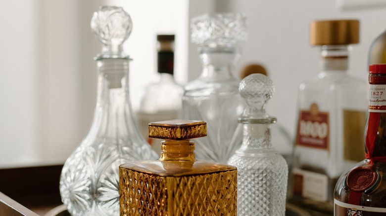 Vintage decanter bottles on bar