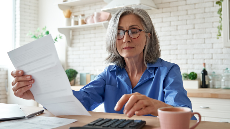 Woman reviewing mortgage documents 