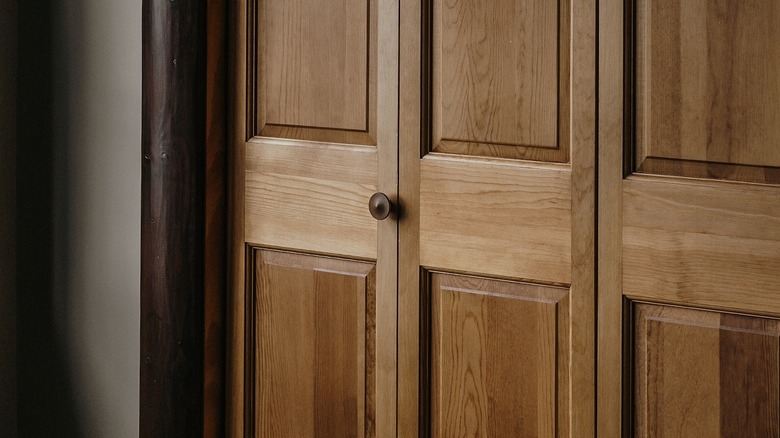 Closet door with knob