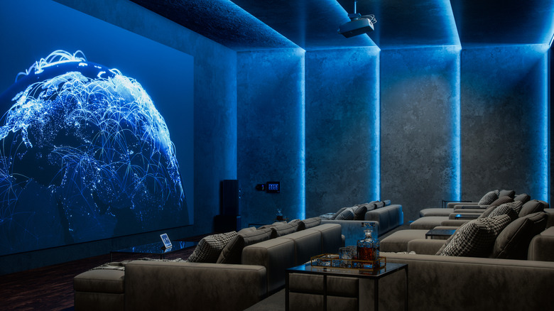 Private home movie theater with celestial imagery on screen