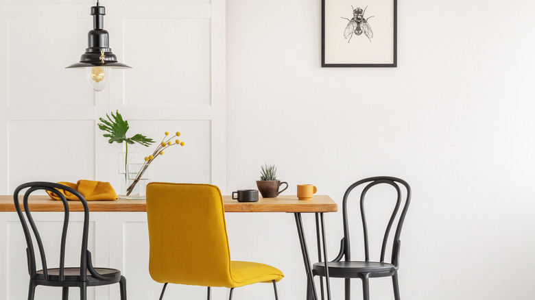 table with yellow chair 