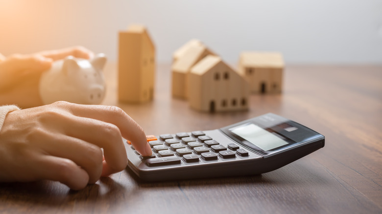 Person calculating housing expenses