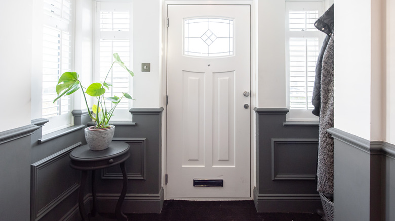 Entryway in a home with gray baseboards