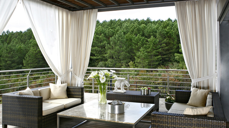 Beautiful curtains draped on a porch