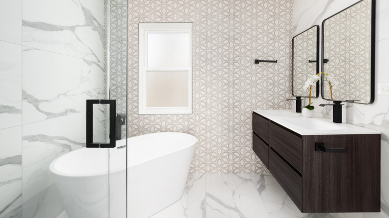 modern bathroom with marble and patterned tile