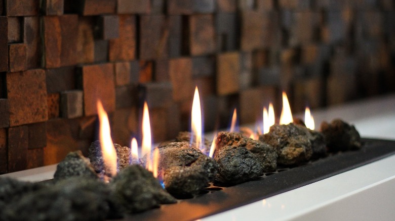 Gas fireplace with stones