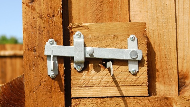 Lever latch on brown gate