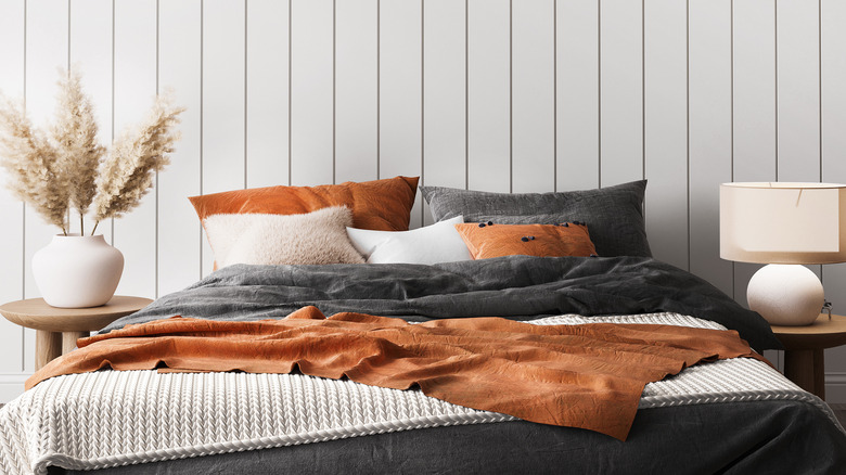 Coastal orange and gray bedroom