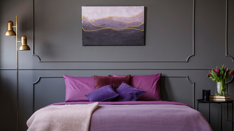 gray walls with purple bedding