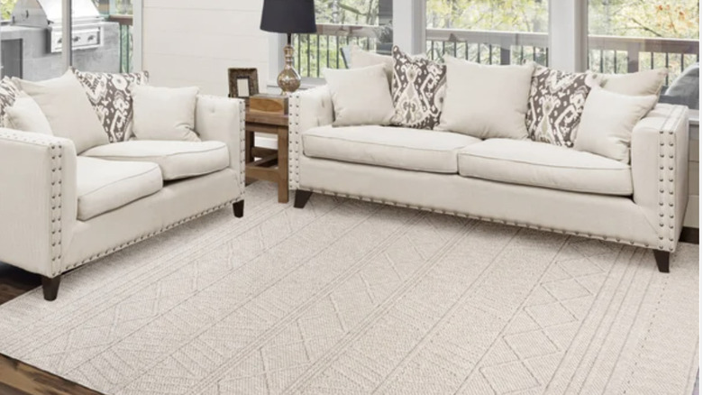 regent area beige rug from costco in living room