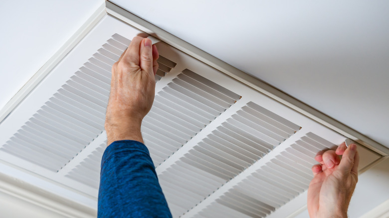 inspecting a ceiling vent