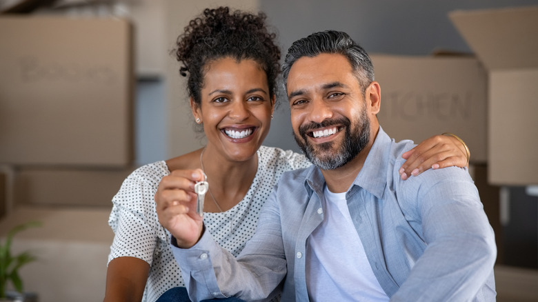 Homebuyers smiling