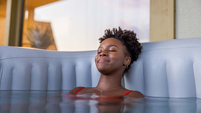 woman enjoying a plunge pool