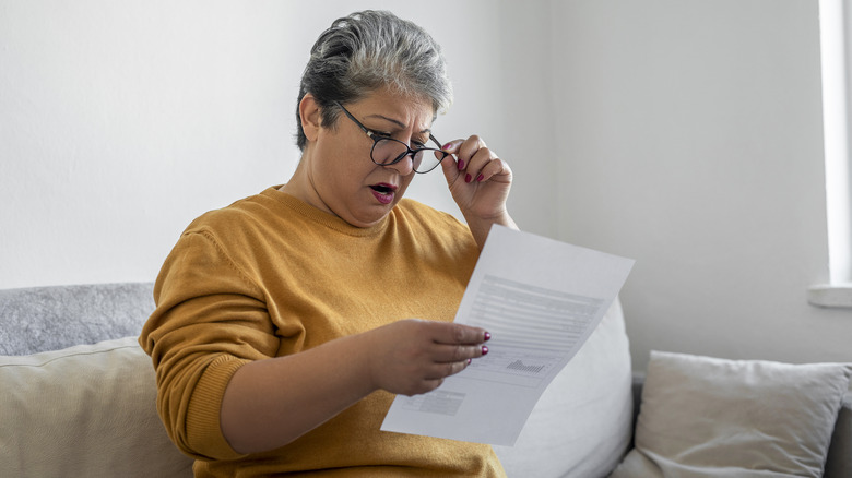 woman shocked at household bills