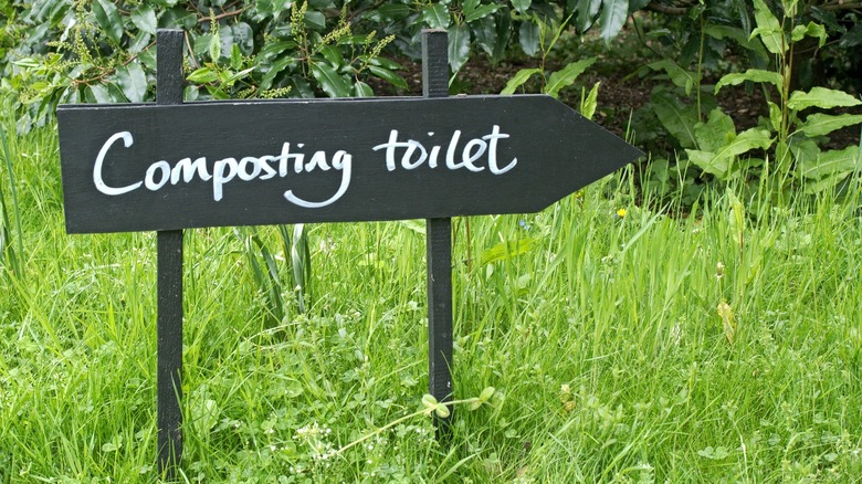 Sign composting toilet