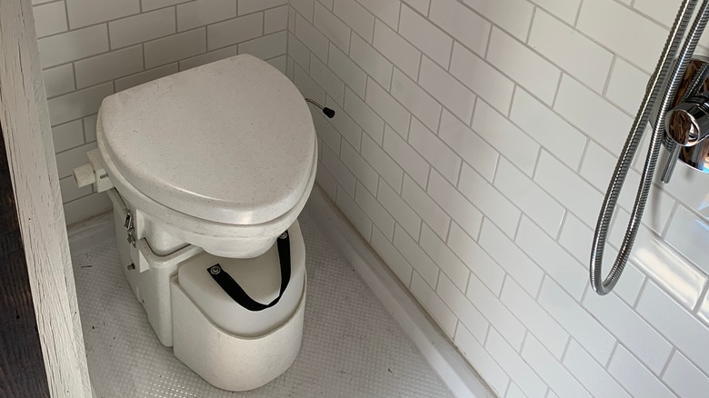 Self-contained composting toilet