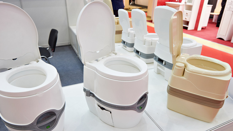 Self-contained composting toilets