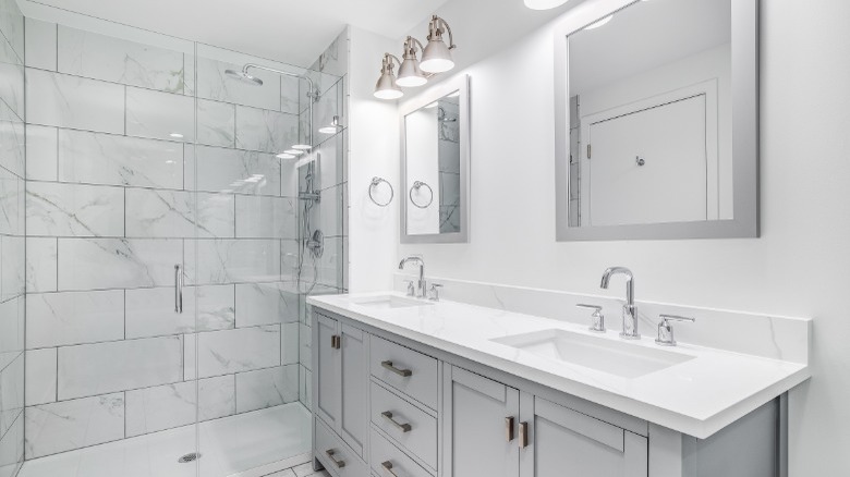 Modern white bathroom curbless shower 