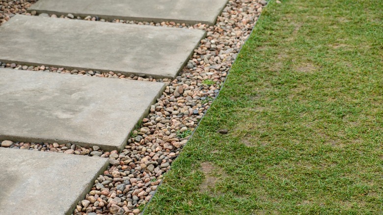gravel and stone path beside lawn