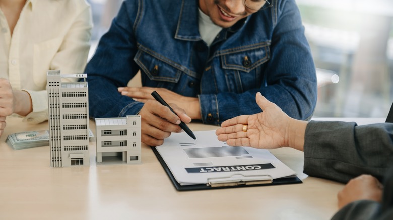 person signing a housing contract