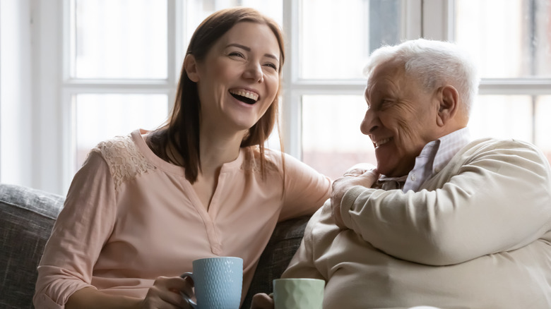 Woman and elderly father