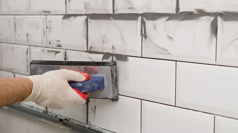 Grouting subway tile backsplash