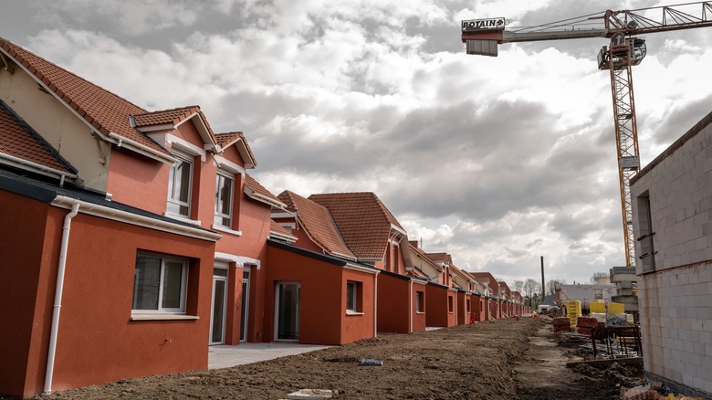 Unfinished line of homes in neighborhood