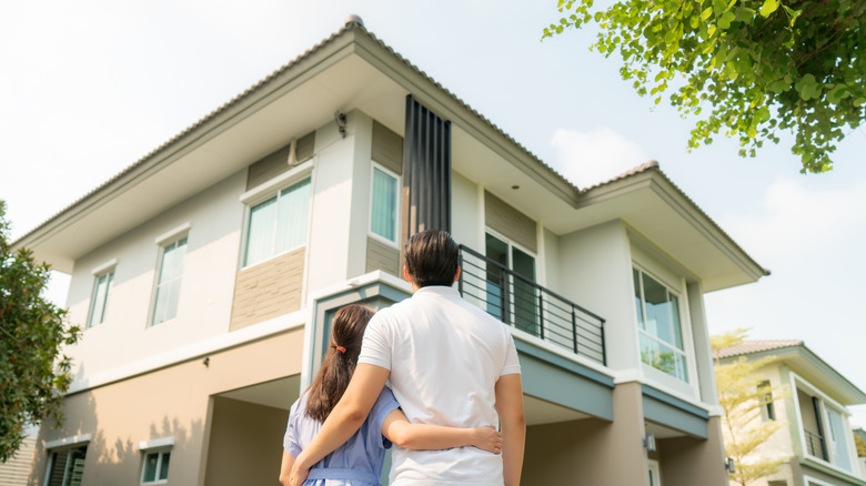 Couple looking at house